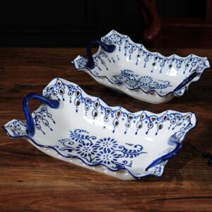 2 rectangled different sizes white and blue china set