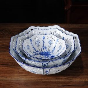 3 different sized round hand painted white and blue china set