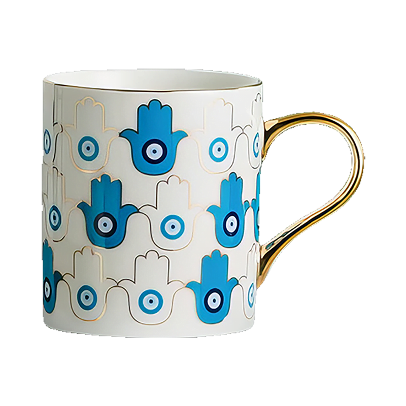 An Azure Hamsa Mug with a hamsa hand on it.