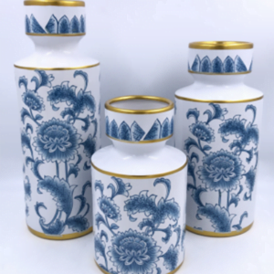 3 blue and white porcelain vases with gold accents.