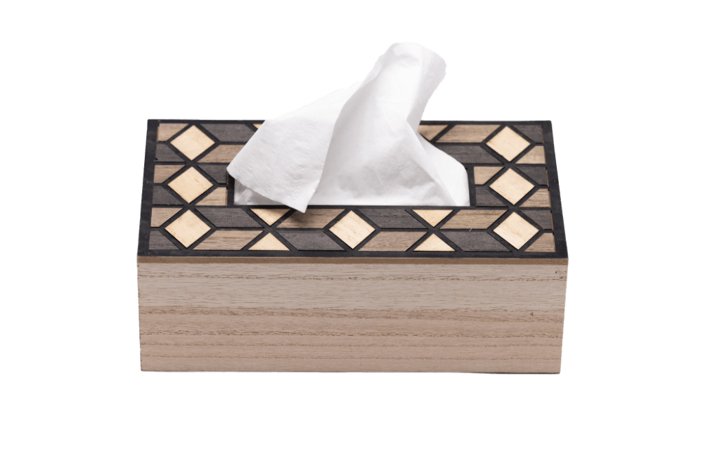wooden tissue box with mosaic pattern design and a tissue inside it.