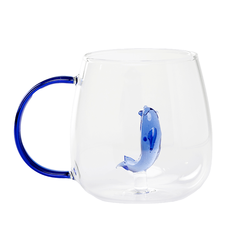 Glass cup with blue handle and 3D blue dolphin inside